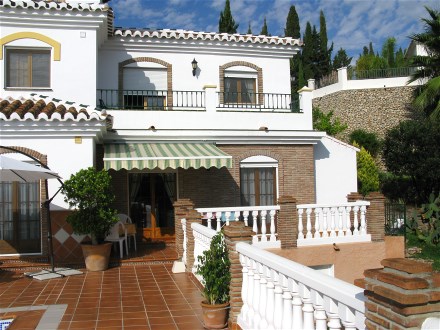 the second apartment has also a large french window to the pool area