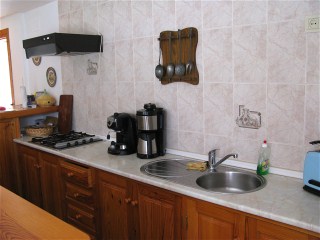 Die offene K�che hat einen Gasherd